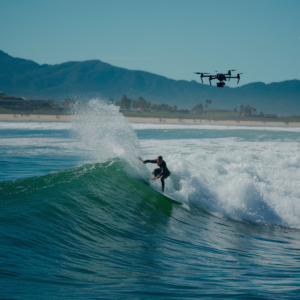 drone filming surfer